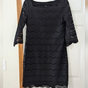 Gorgeous White House. Black market. Little black dress. Lace 3/4 sleeve overlay